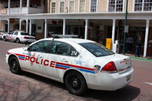 A police car parked on a street.