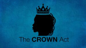 Symbol of someone wearing a crown, with label reading "The CROWN Act".