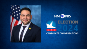 Man in a suit with an American flag background next to NM PBS "Election 2024 Candidate Conversations" graphic.