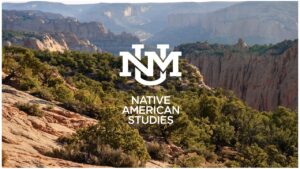 Landscape view of canyons and forests with a logo for the University of New Mexico Native American Studies program in the foreground.